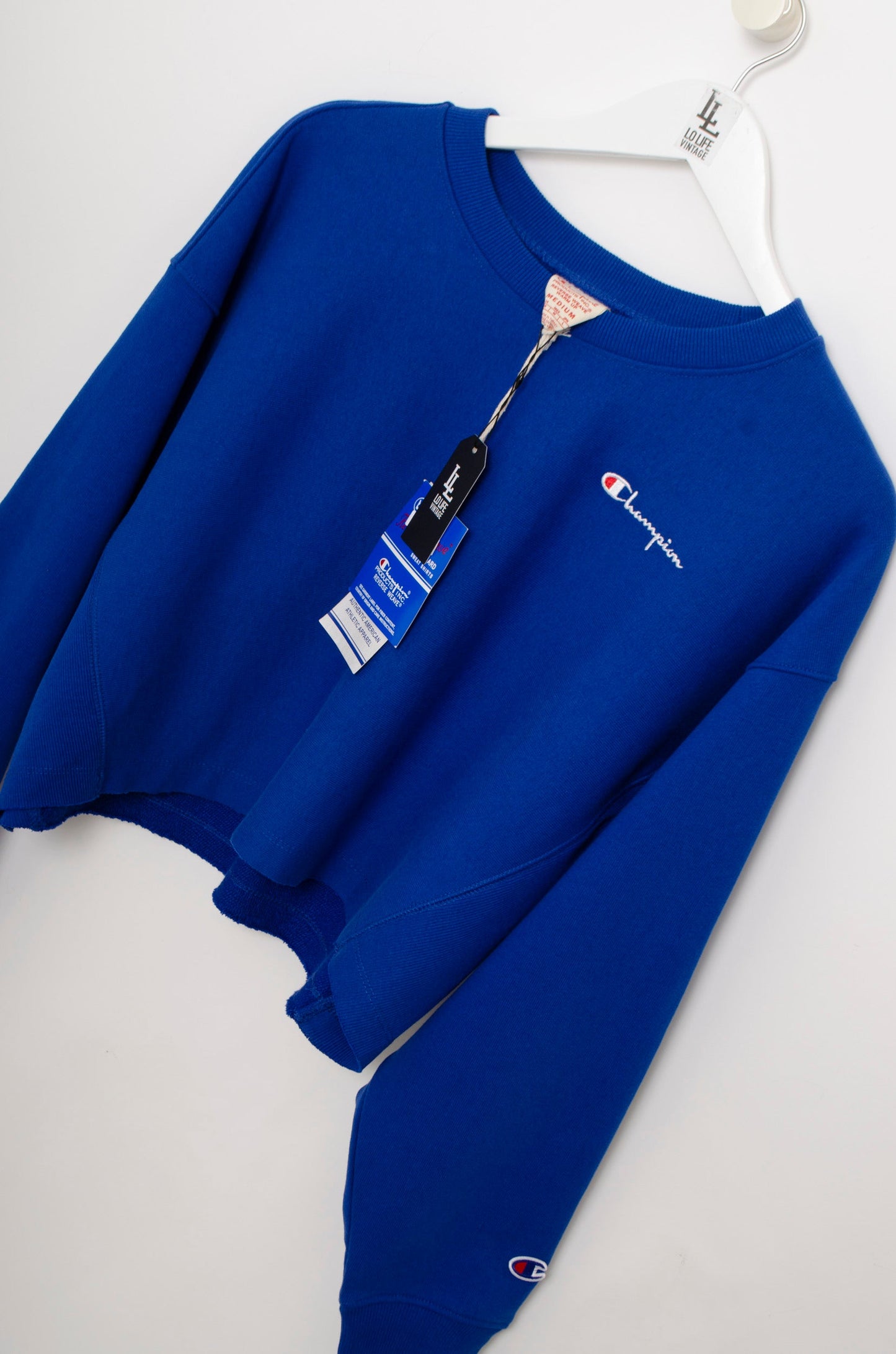 CHAMPION SUDADERA CROP AZUL OVERSIZE