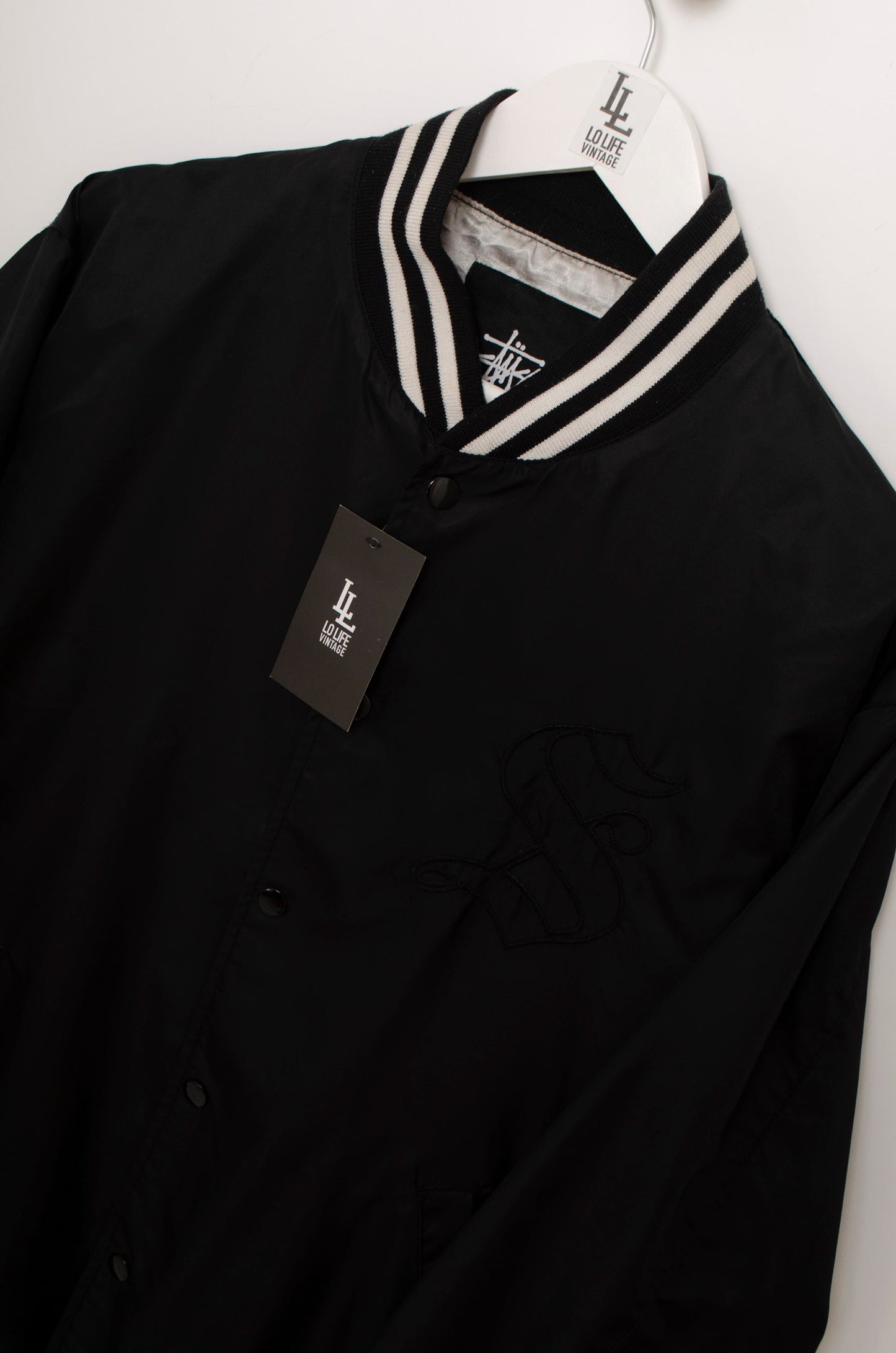 VARSITY STUSSY BLACK LIMITED.